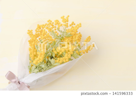 Studio photoshoot of a mimosa bouquet 07 141596333