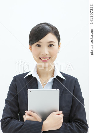 Business woman with tablet Business woman with tablet 141597338