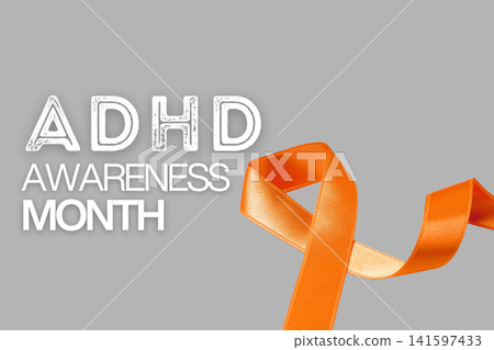 Bright orange ribbon signifies ADHD awareness and support efforts Bright orange ribbon signifies ADHD awareness and support efforts 141597433