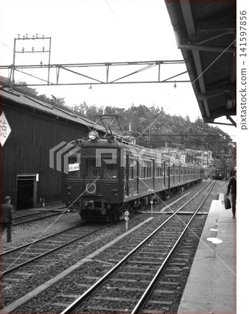 Ome Line commuter train Ome Line commuter train 141597856
