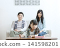 A family teaching in the living room 141598201