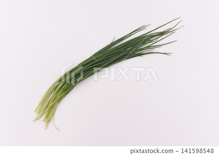 Fresh Green Chives Isolated on White Background Fresh Green Chives Isolated on White Background 141598548