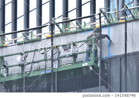 Construction site, office building maintenance, waterproofing work scene. 141598746