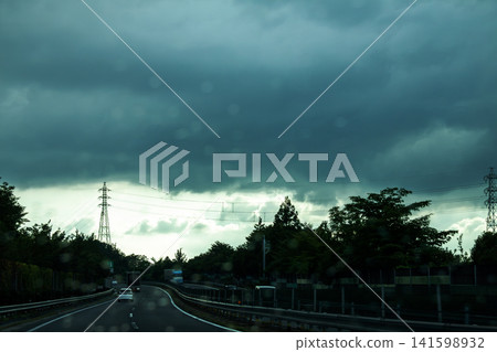 Image of a sudden, heavy downpour in the direction of travel Image of a sudden, heavy downpour in the direction of travel 141598932