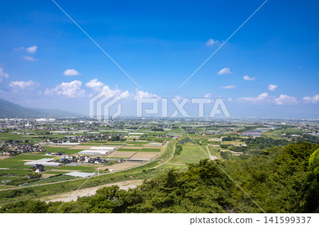 A view of the Chikugo Plain, the Chikugo River, and the city of Kurume from a hill in Haki, Fukuoka Prefecture. A view of the Chikugo Plain, the Chikugo River, and the city of Kurume from a hill in Haki, Fukuoka Prefecture. 141599337