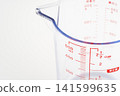 Close-up of a 500ml measuring cup 141599635