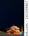 A church in winter and the starry sky 141599867