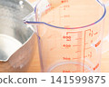 Measuring cup and Yukihira pot 141599875