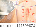 Measuring cup and Yukihira pot 141599878