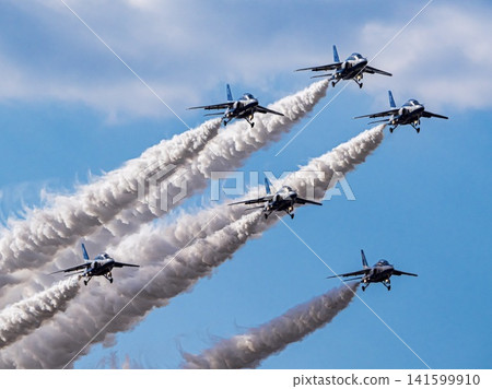 A formation of six Blue Impulse aircraft and smoke trails. A formation of six Blue Impulse aircraft and smoke trails. 141599910