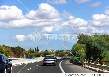 Highway in Sicily with Mount Etna view. Highway in Sicily with Mount Etna view. 141600118