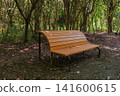 A bench standing quietly in the middle of the forest 141600615