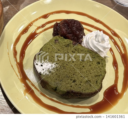 Matcha chiffon cake with red bean paste and whipped cream. Matcha chiffon cake with red bean paste and whipped cream. 141601361