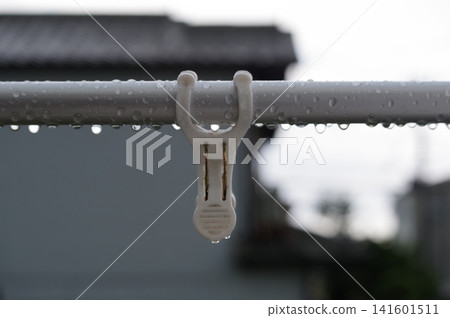 Clothesline on rainy day Clothesline on rainy day 141601511