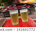 Drinking Bia Hoi on the streets of Hanoi 141601772
