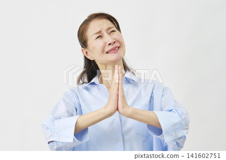 Elderly woman begging on white background Elderly woman begging on white background 141602751
