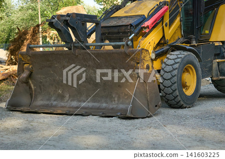 Load bucket of construction bulldozer for work Load bucket of construction bulldozer for work 141603225