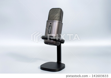 Professional usb microphone on stand for studio recording and podcasting Professional usb microphone on stand for studio recording and podcasting 141603633