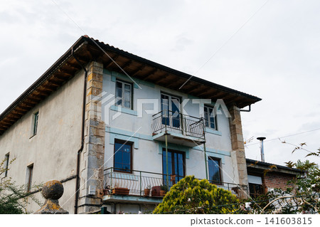 Exterior view of a traditional Spanish house in Cantabria, Spain Exterior view of a traditional Spanish house in Cantabria, Spain 141603815