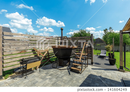 Backyard Patio with Hot Tub, Grill, and Relaxation Deck Backyard Patio with Hot Tub, Grill, and Relaxation Deck 141604249