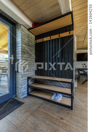 Modern Entryway Hall Tree and Shoe Bench Interior Detail Modern Entryway Hall Tree and Shoe Bench Interior Detail 141604250