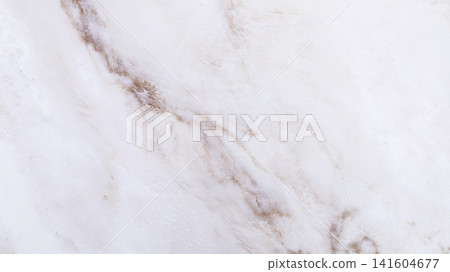 Polished white marble surface with soft brown vein pattern background Polished white marble surface with soft brown vein pattern background 141604677