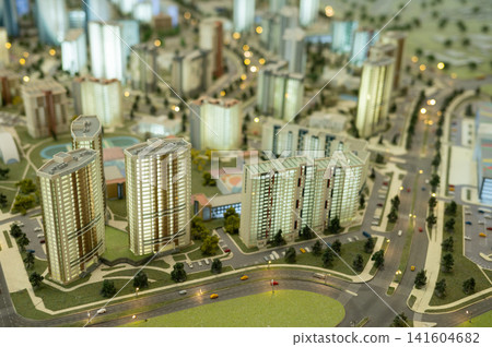 Scale model buildings forming urban planning display Scale model buildings forming urban planning display 141604682