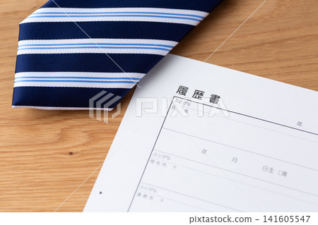 Resume and blue regimental tie Resume and blue regimental tie 141605547
