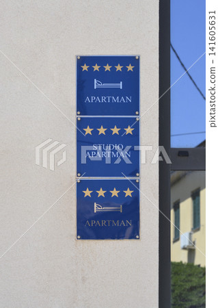 Apartment categorization signs on a wall Apartment categorization signs on a wall 141605631
