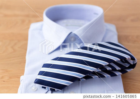 Blue regimental tie and dress shirt Blue regimental tie and dress shirt 141605865