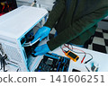 Close-up of semiconductor microchip on circuit board, motherboard processor for computer repair, hardware technology and chip manufacturing industry concept. 141606251