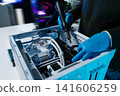 Close-up of semiconductor microchip on circuit board, motherboard processor for computer repair, hardware technology and chip manufacturing industry concept. 141606259