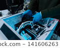 Close-up of semiconductor microchip on circuit board, motherboard processor for computer repair, hardware technology and chip manufacturing industry concept. 141606263