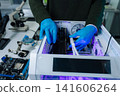 Close-up of semiconductor microchip on circuit board, motherboard processor for computer repair, hardware technology and chip manufacturing industry concept. 141606264