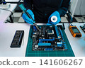 Close-up of semiconductor microchip on circuit board, motherboard processor for computer repair, hardware technology and chip manufacturing industry concept. 141606267
