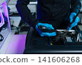 Close-up of semiconductor microchip on circuit board, motherboard processor for computer repair, hardware technology and chip manufacturing industry concept. 141606268