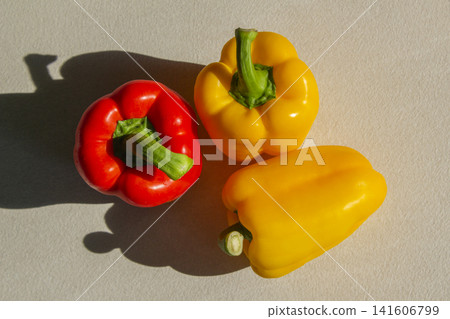 It is a bell pepper placed on a white background. It is a bell pepper placed on a white background. 141606799