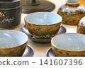 Kutani ware tea utensils... [Tea bowls and teapots] 141607396