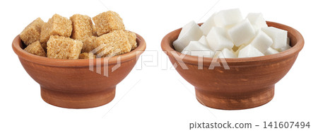 brown and white sugar in a ceramic bowl isolated on white background brown and white sugar in a ceramic bowl isolated on white background 141607494