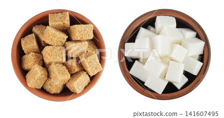 brown and white sugar in a ceramic bowl isolated on white background. Top view. Flat lay brown and white sugar in a ceramic bowl isolated on white background. Top view. Flat lay 141607495