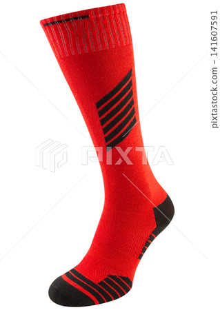 Red and black athletic knee-high sock isolated on white background. Compression sports sock for football, skiing, and trekking Red and black athletic knee-high sock isolated on white background. Compression sports sock for football, skiing, and trekking 141607591
