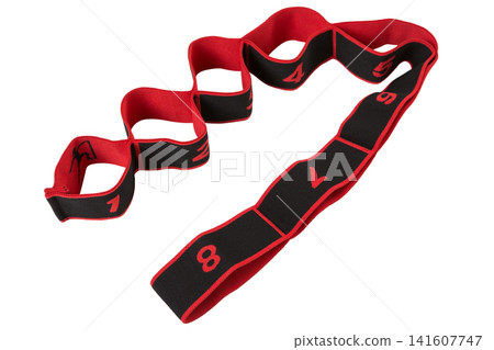 Red and black multi loop yoga stretch strap isolated on white background. Elastic resistance band with numbered loops for stretching, gymnastics, and physical therapy Red and black multi loop yoga stretch strap isolated on white background. Elastic resistance band with numbered loops for stretching, gymnastics, and physical therapy 141607747
