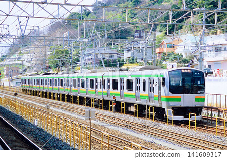 A Tokaido Line E217 series train in Shonan livery (5-car set, train set photo) parked on a siding. A Tokaido Line E217 series train in Shonan livery (5-car set, train set photo) parked on a siding. 141609317