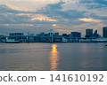 The cityscape of Tokyo Bay and the Rainbow Bridge at dusk 141610192