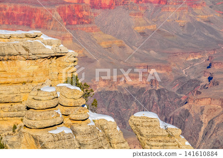 On a clear winter morning, from Mather Point in Grand Canyon National Park, the canyon is bathed in the morning sun, creating a breathtaking, three-dimensional view. On a clear winter morning, from Mather Point in Grand Canyon National Park, the canyon is bathed in the morning sun, creating a breathtaking, three-dimensional view. 141610884