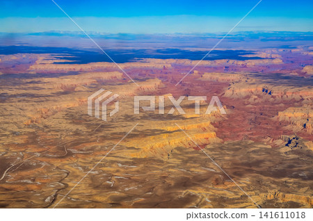 [Aerial View] The magnificent scenery of the Grand Canyon: The Colorado River and the grand canyon as seen from an airplane window. 141611018