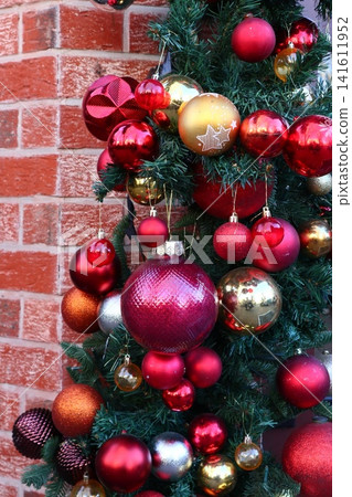 Amazing Christmas tree and brick wall. Amazing Christmas tree and brick wall. 141611952