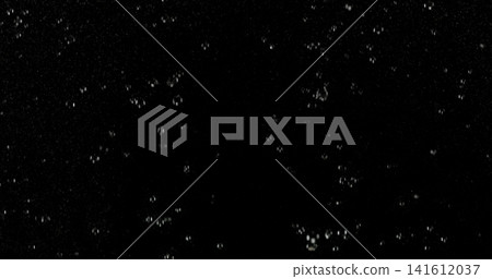 High speed close up of falling rain droplets isolated on a black background creating a realistic weather VFX overlay perfect for cinematic compositing visual effects motion graphics and atmospheric High speed close up of falling rain droplets isolated on a black background creating a realistic weather VFX overlay perfect for cinematic compositing visual effects motion graphics and atmospheric 141612037