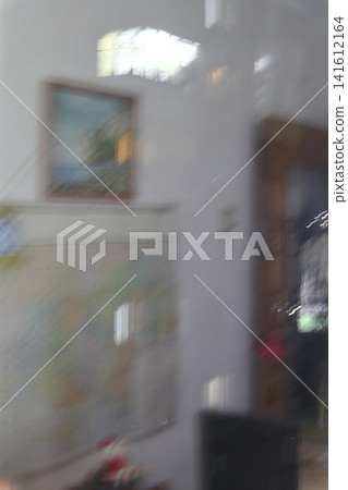 The reflection of the room in the window. The reflection of the room in the window. 141612164