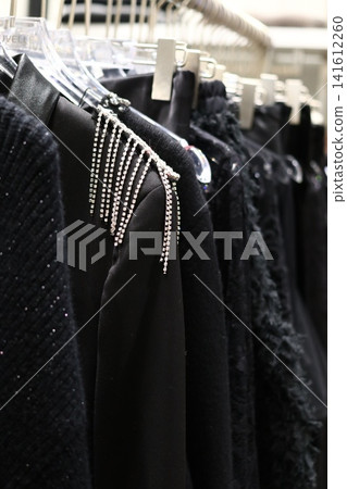 Clothes store in shopping mall. 141612260
